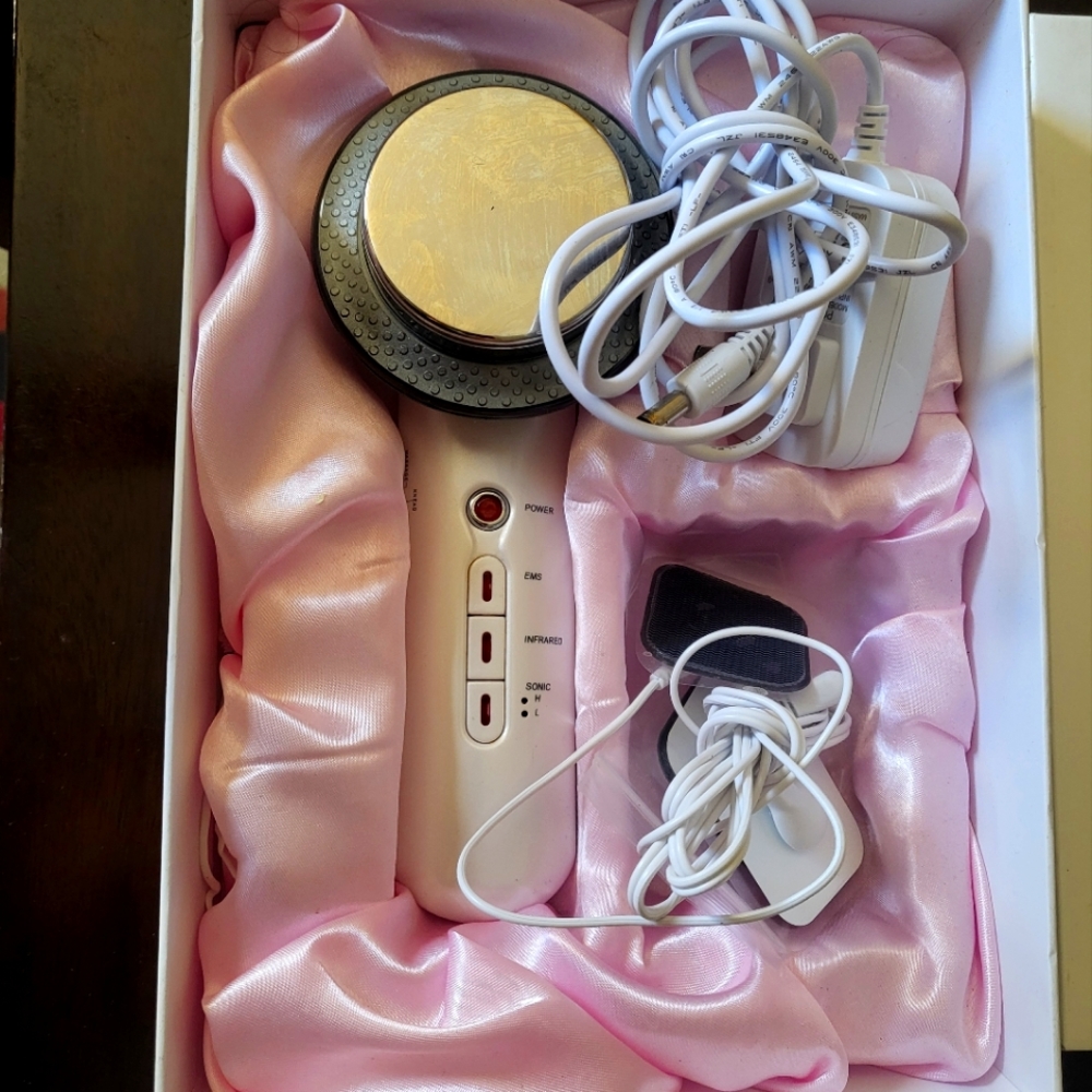 Sonic skin care tool with infrared USED